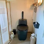 Koselig Pa Eget Tun Med Varmtvanns Utedusj * As
